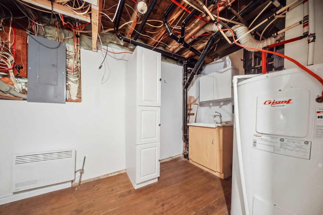 Rangement — 15 - 15C Rue St-Jean-Baptiste, L'Anse-Saint-Jean