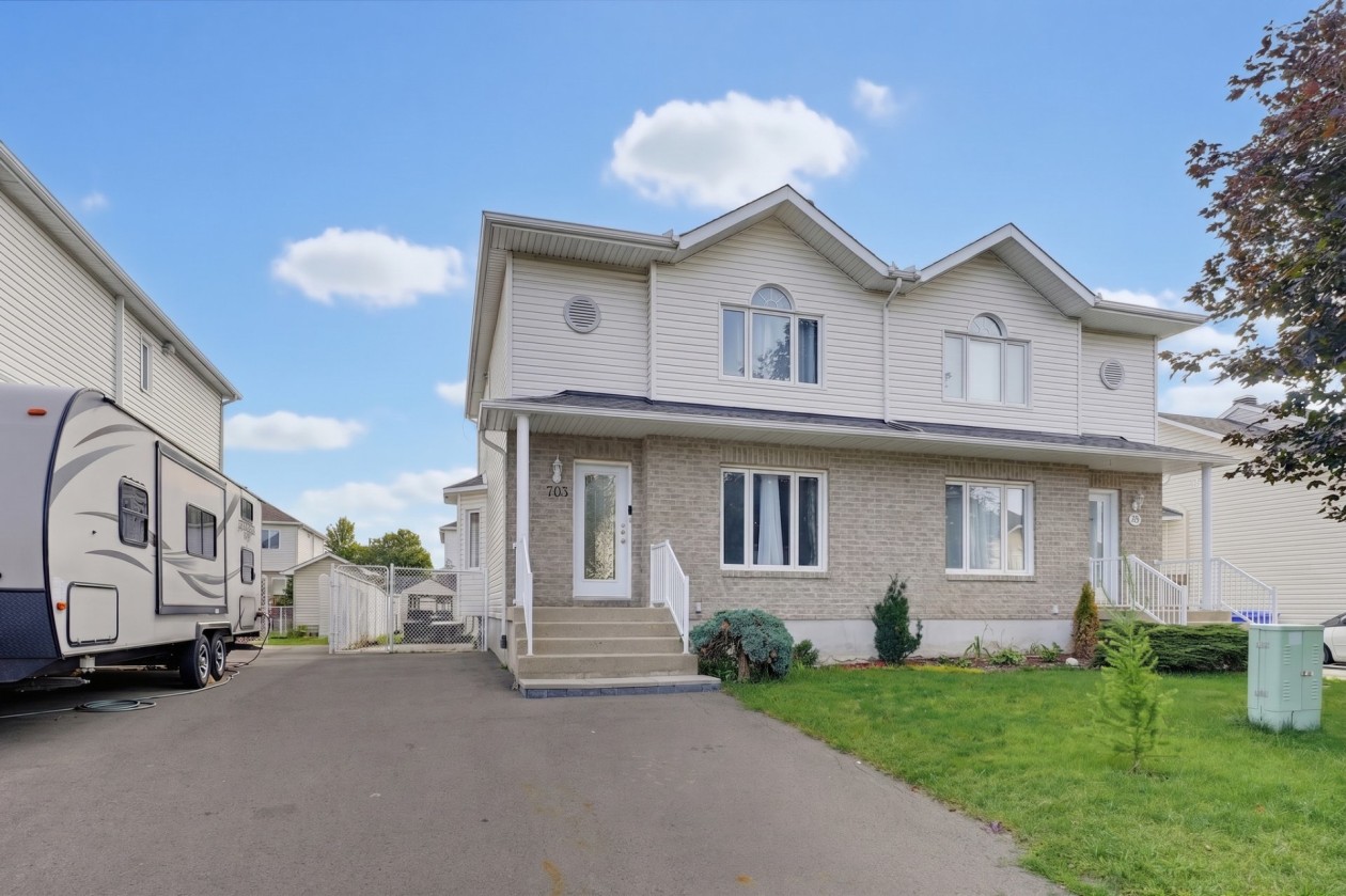 703, Rue A.-Gibeault