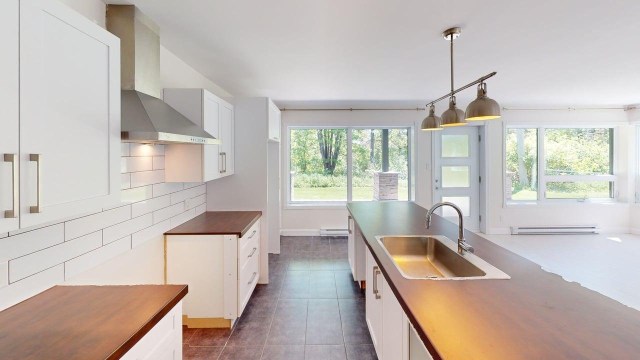 Photo 4 — 130D Rue du Domaine-sur-le-Golf, Saguenay