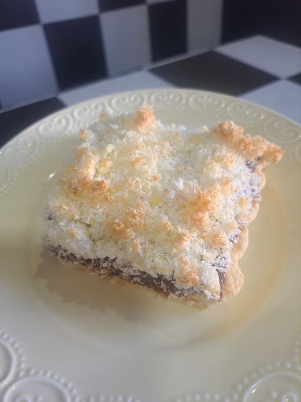 Tarta de coco y dulce de leche porcion