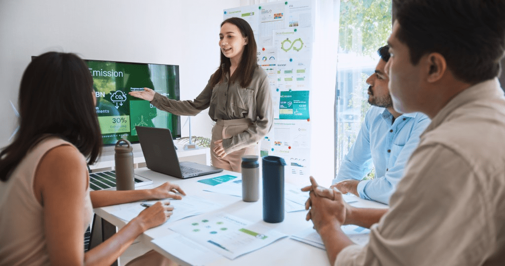 woman giving a presentation to a group of people