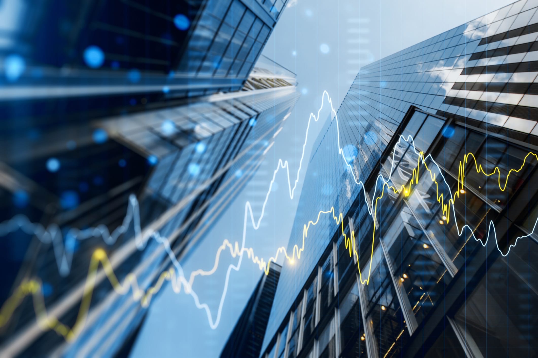 buildings with digital graph overlay for finance
