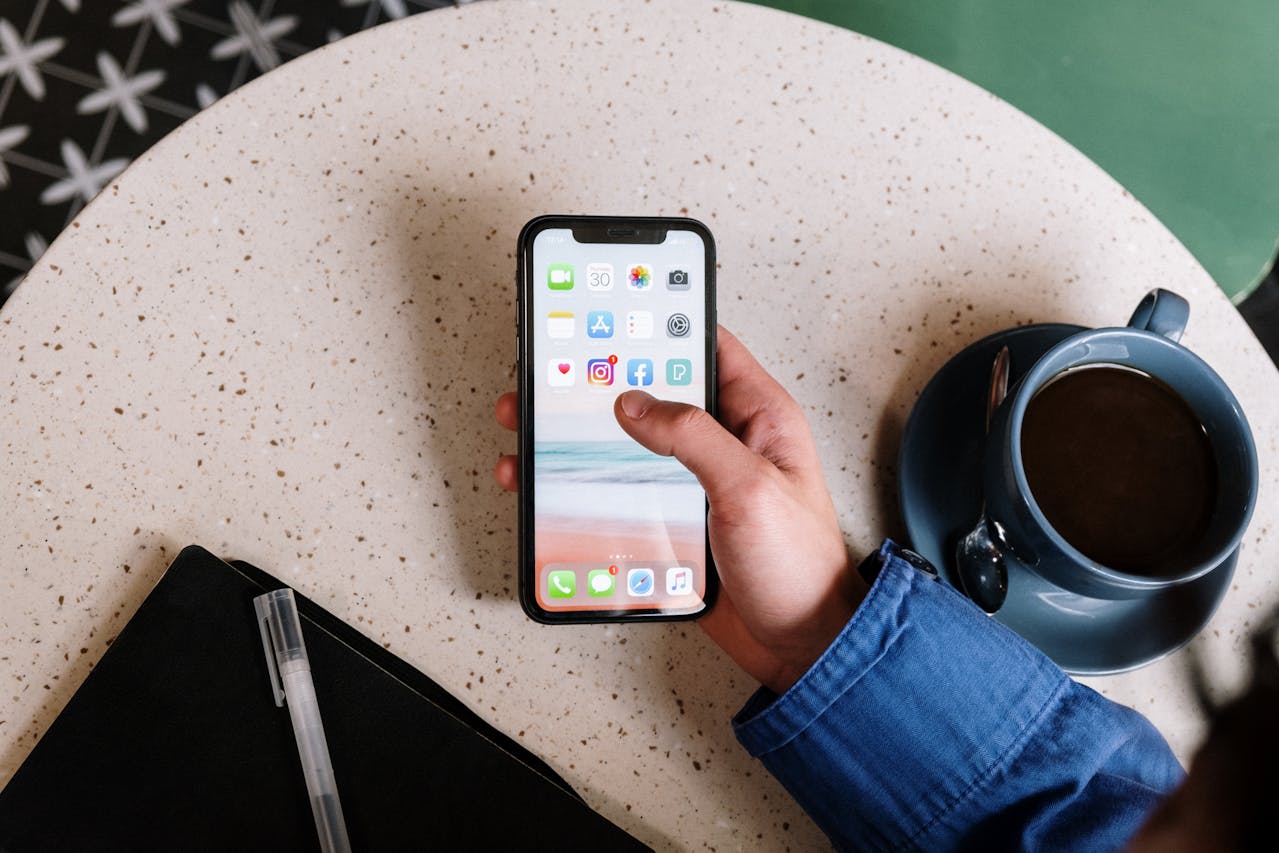 Photo by cottonbro studio on Pexels https://www.pexels.com/photo/person-holding-black-iphone-7-5053738/