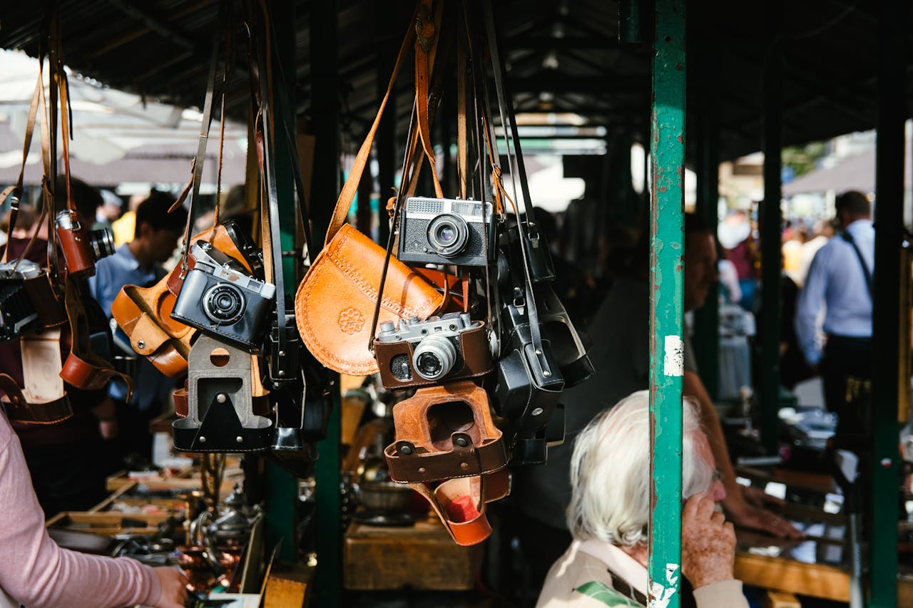  Photo by Kai Pilger on Pexelshttps://www.pexels.com/photo/people-standing-near-store-and-different-cameras-hanging-3170430/ 