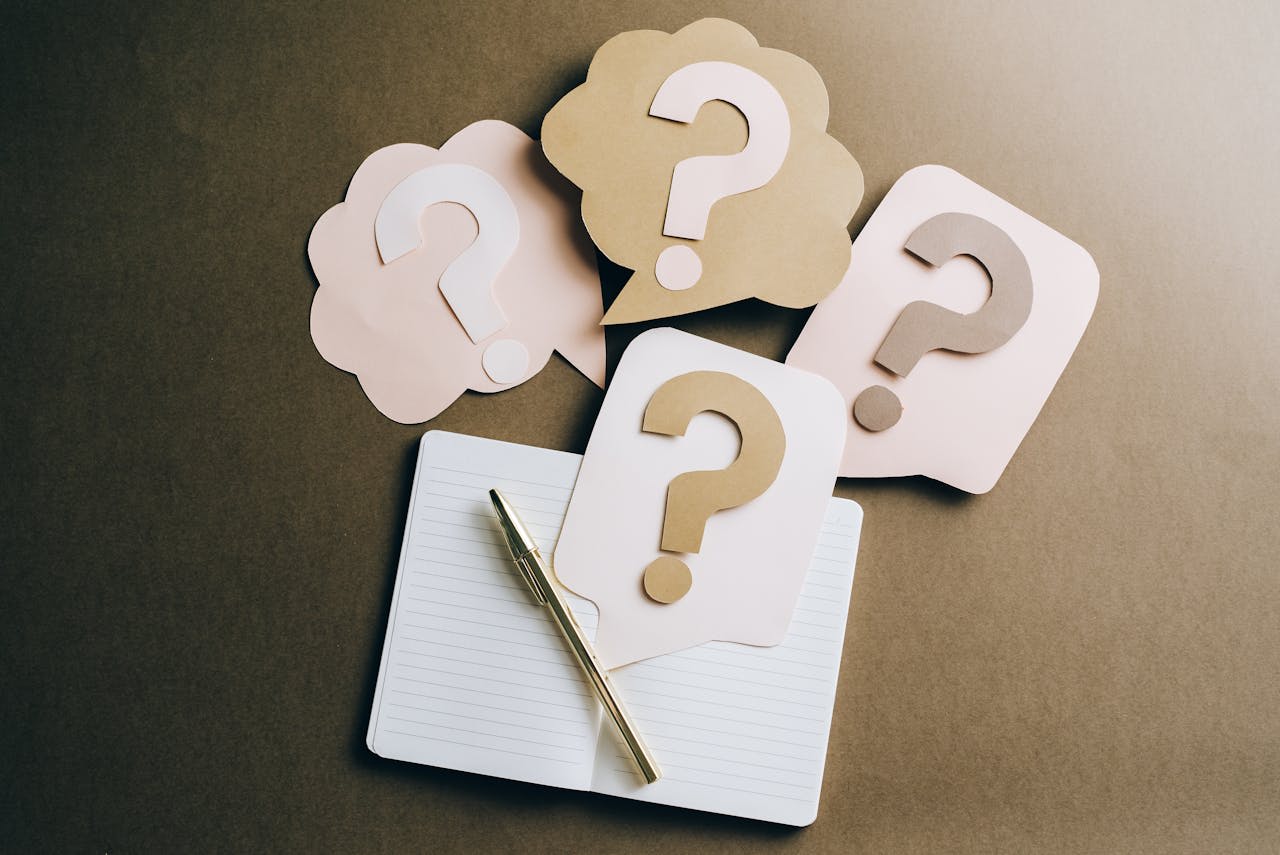 Photo by Leeloo The First: https://www.pexels.com/photo/question-marks-on-craft-paper-5428830/ 