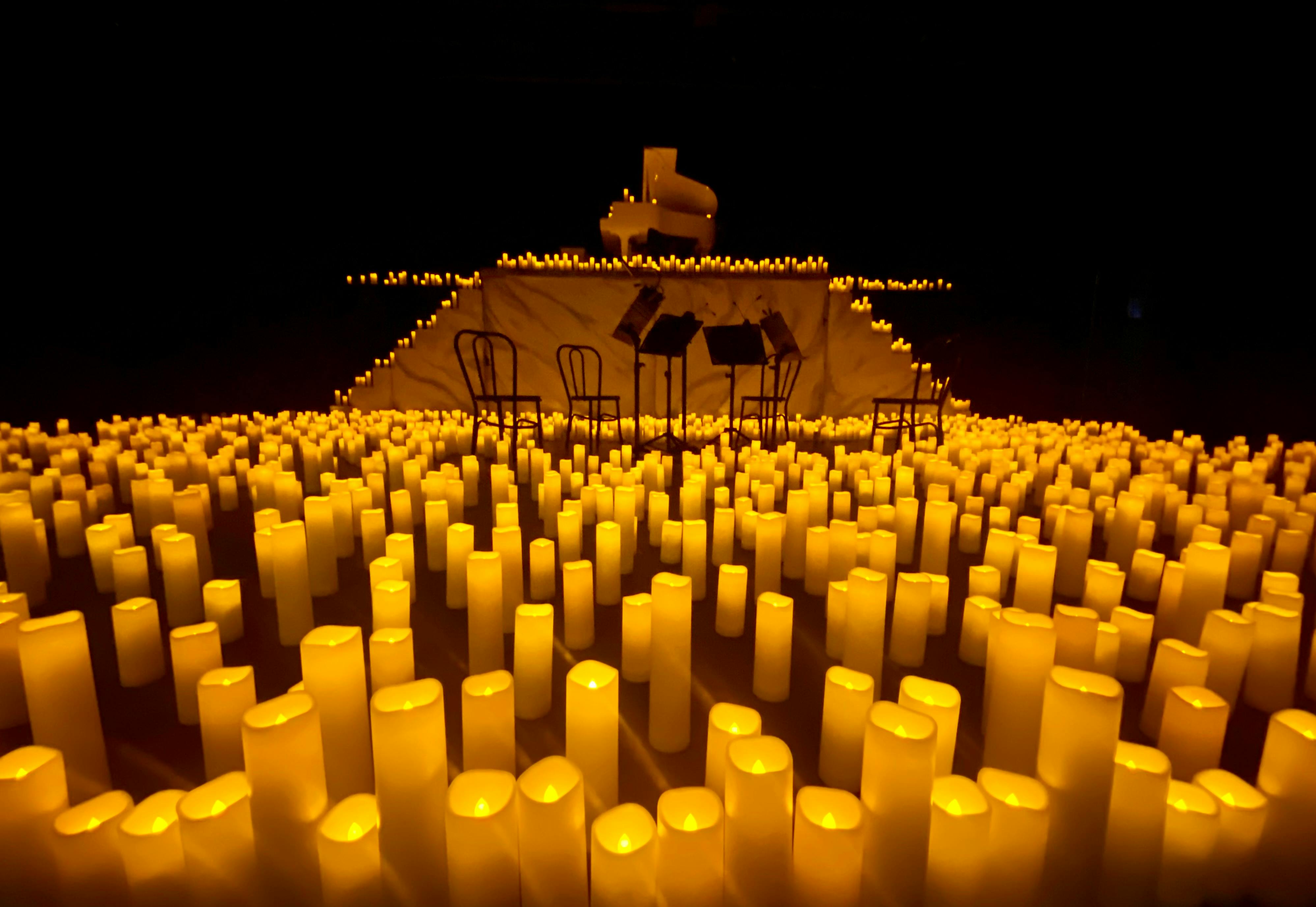https://www.pexels.com/photo/stage-full-of-candles-13084352/  Photo by Shelby Cox on Pexels