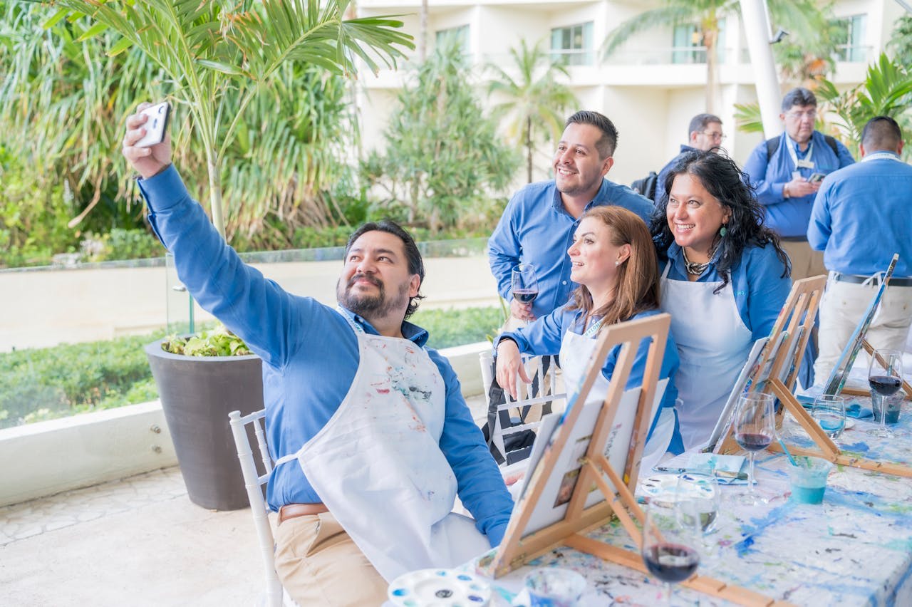 Photo by Israel Torres: https://www.pexels.com/photo/people-taking-a-selfie-during-a-painting-class-20173391/ 