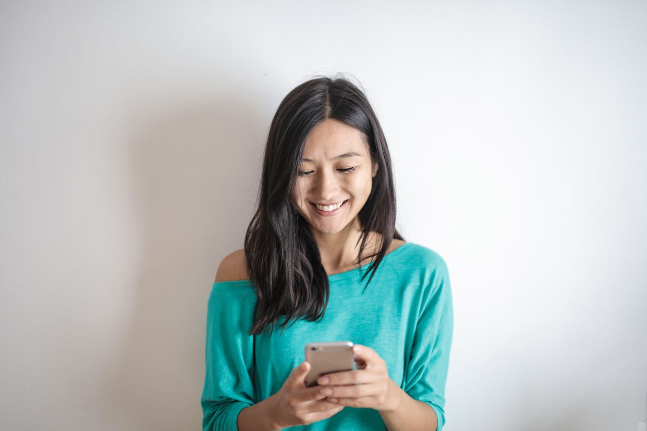 Photo by Andrea Piacquadio: https://www.pexels.com/photo/photo-of-woman-using-mobile-phone-3756682/ 