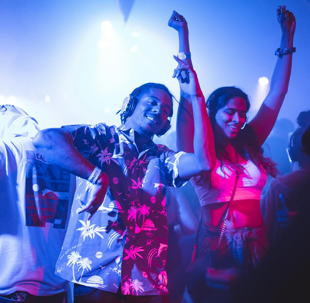 https://www.pexels.com/photo/smiling-man-standing-and-dancing-near-smiling-woman-surrounded-with-people-2240771/ Photo by Martin Lopez on Pexels