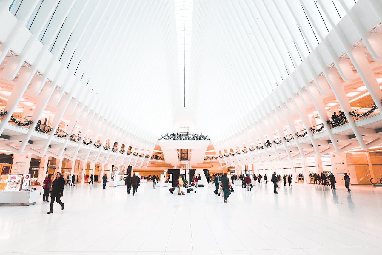 https://www.pexels.com/photo/people-walking-in-world-trade-center-5914901/ Photo by Brady Knoll on Pexels