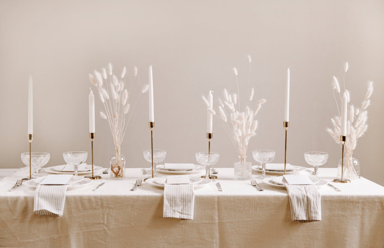 Photo by Katrina Justovica on Pexels https://www.pexels.com/photo/setting-over-a-table-draped-in-white-table-cloth-7958250/ 