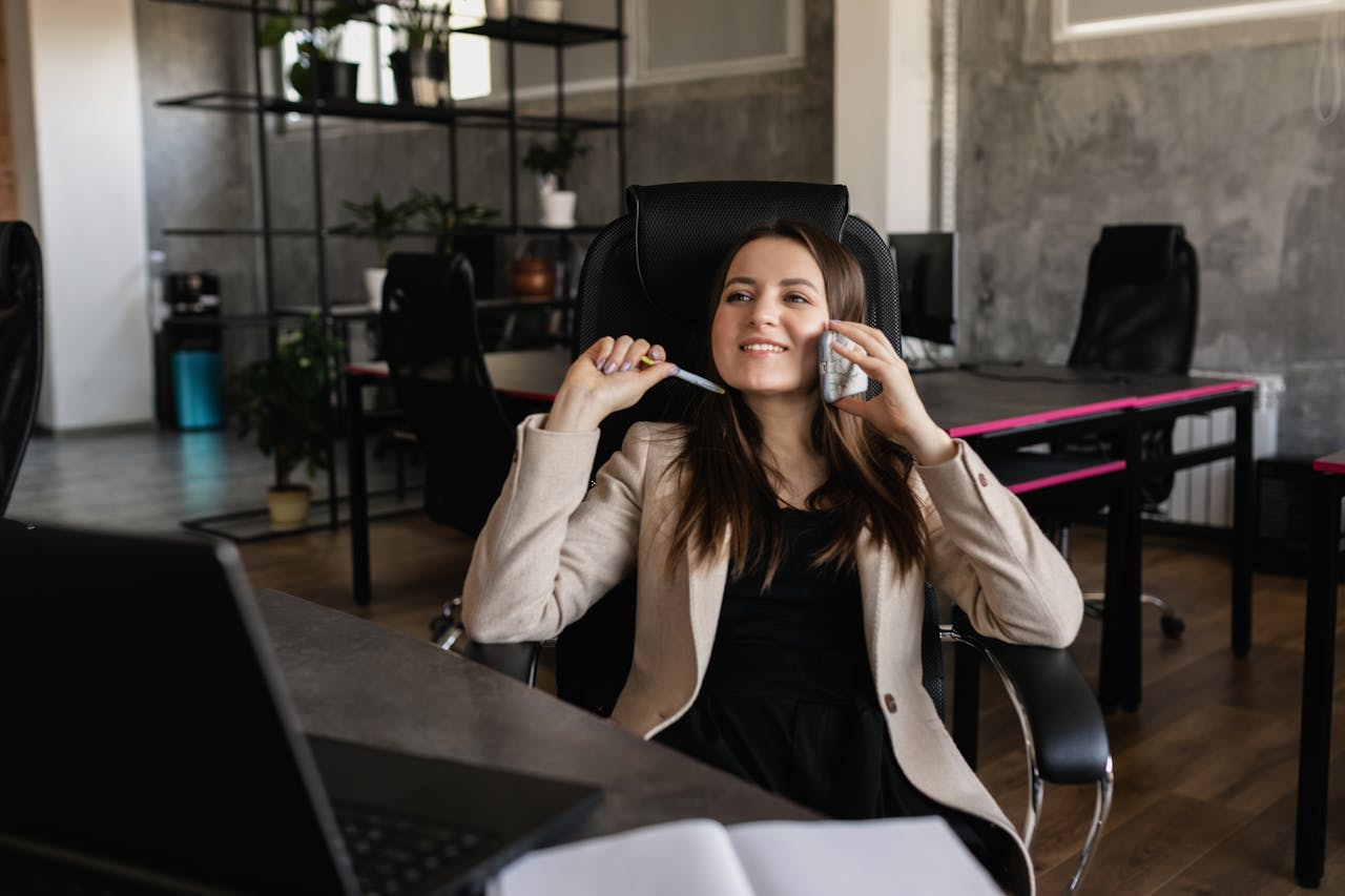 Pexels Image from Pexels, Alena Darmel https://www.pexels.com/photo/photo-of-a-woman-talking-on-the-phone-while-smiling-7706969/