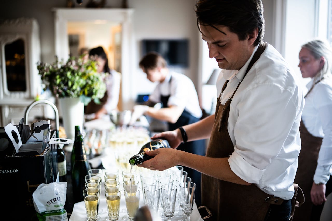 Photo by Rene Terp: https://www.pexels.com/photo/man-pouring-wine-on-glasses-3217157/ 