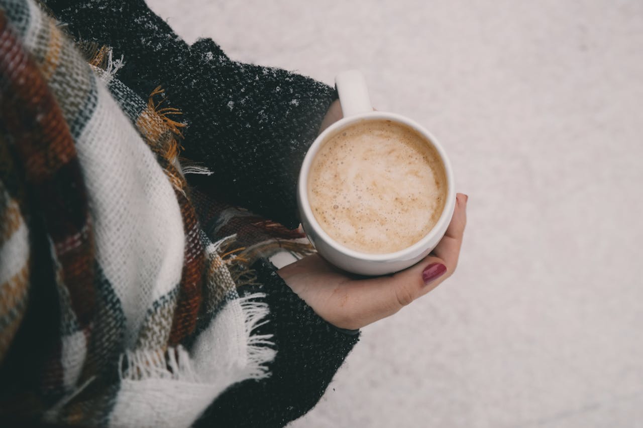  Photo by Brigitte Tohm: https://www.pexels.com/photo/person-holding-mug-of-coffee-287222/ 