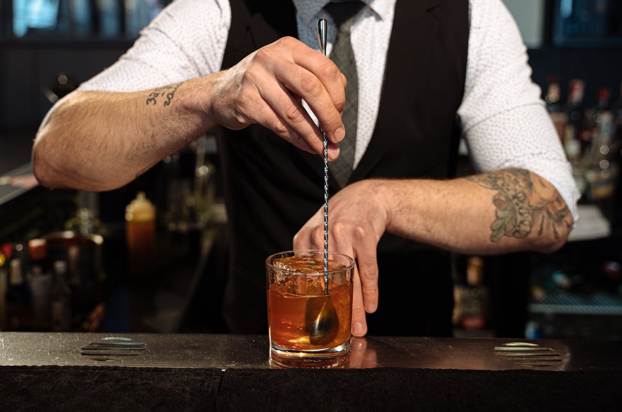 https://www.pexels.com/photo/barman-in-black-vest-making-cocktail-4485397/ Photo by Antoni Shkraba on Pexels 