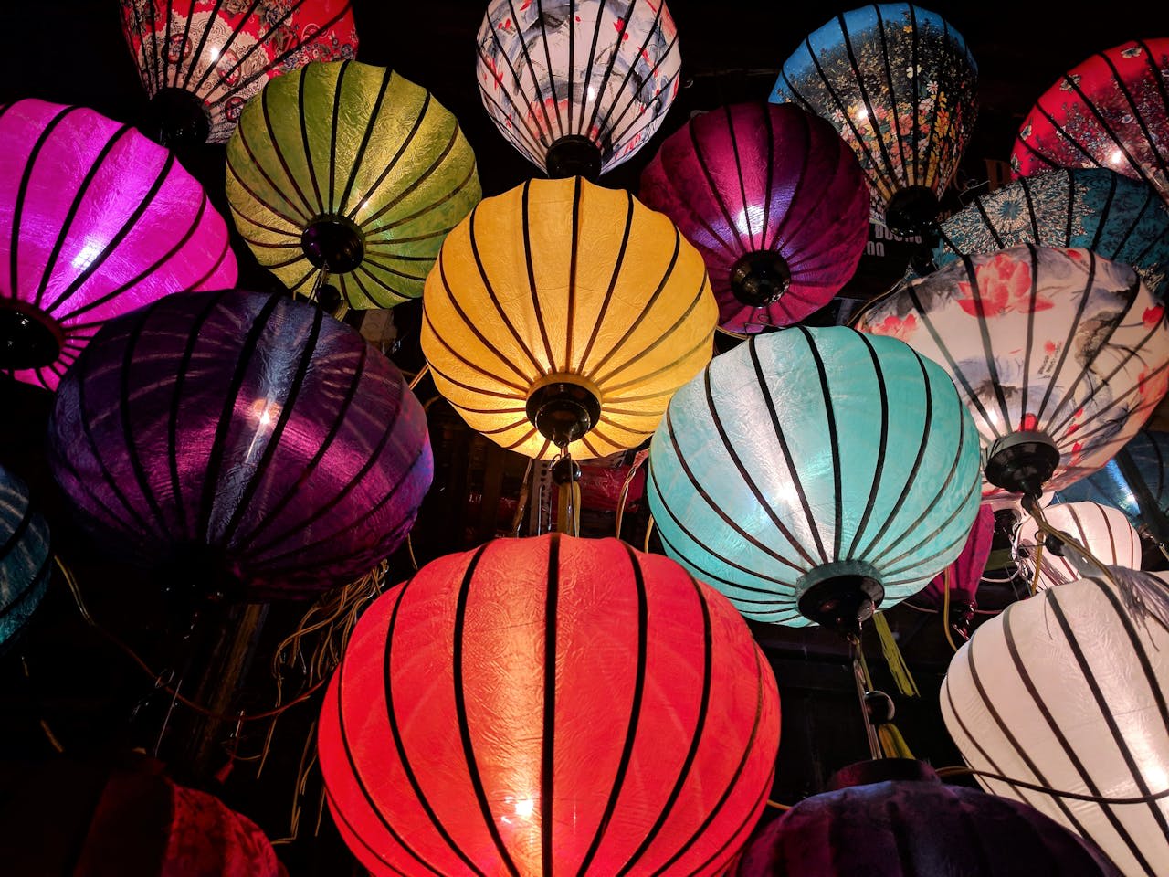 https://www.pexels.com/photo/red-blue-yellow-and-white-sky-lantern-lot-707265/  Photo by Expect Best on Pexels