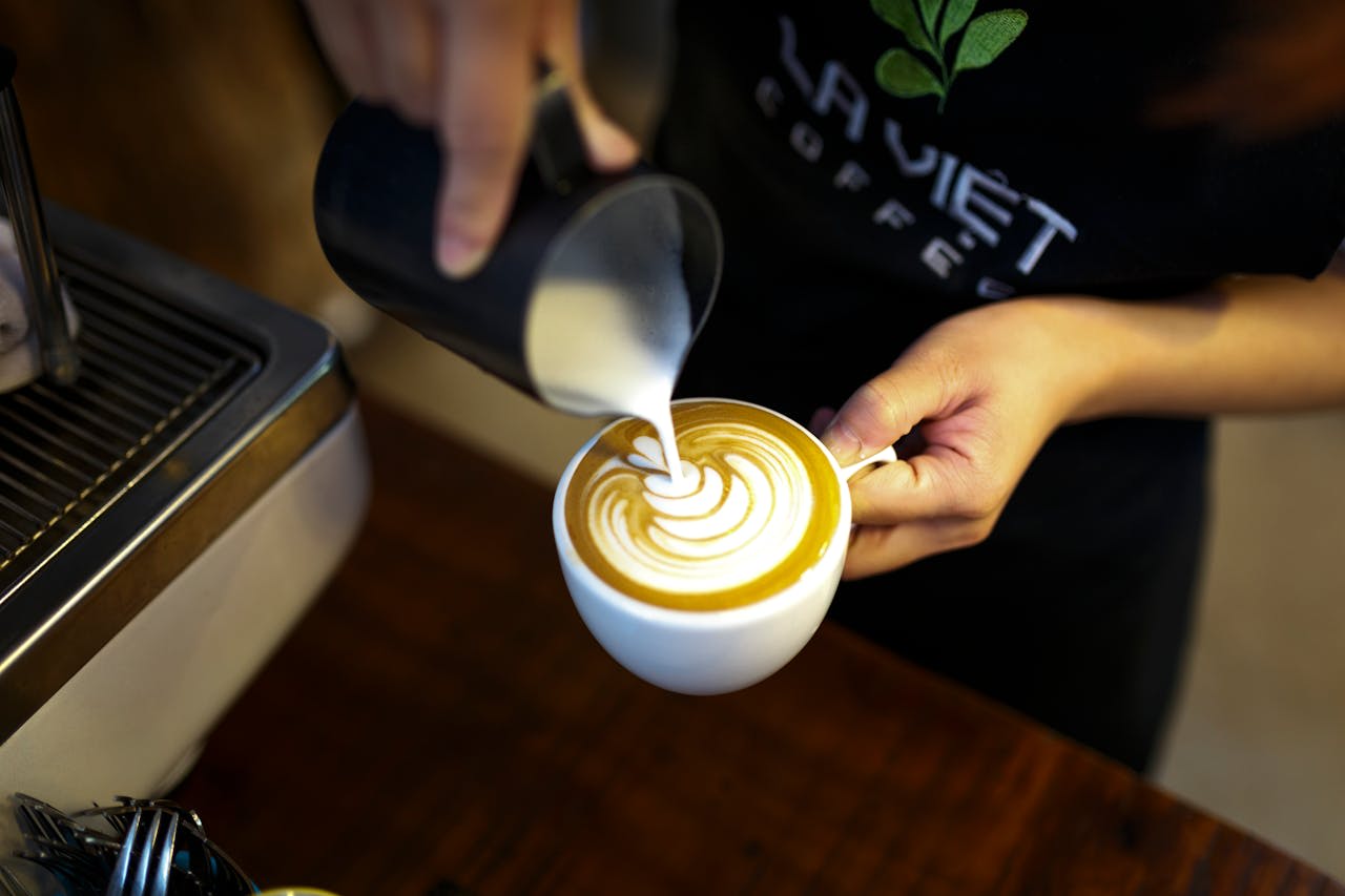 https://www.pexels.com/photo/person-making-cappuccino-2159135/  Photo by Quang Nguyen Vinh on Pexels