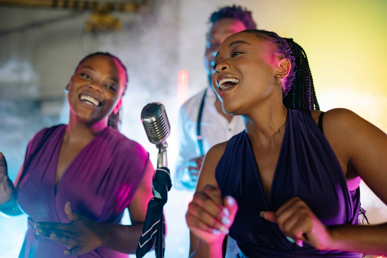 https://www.pexels.com/photo/women-singing-together-9008830/  Photo by Yan Krukau on Pexels