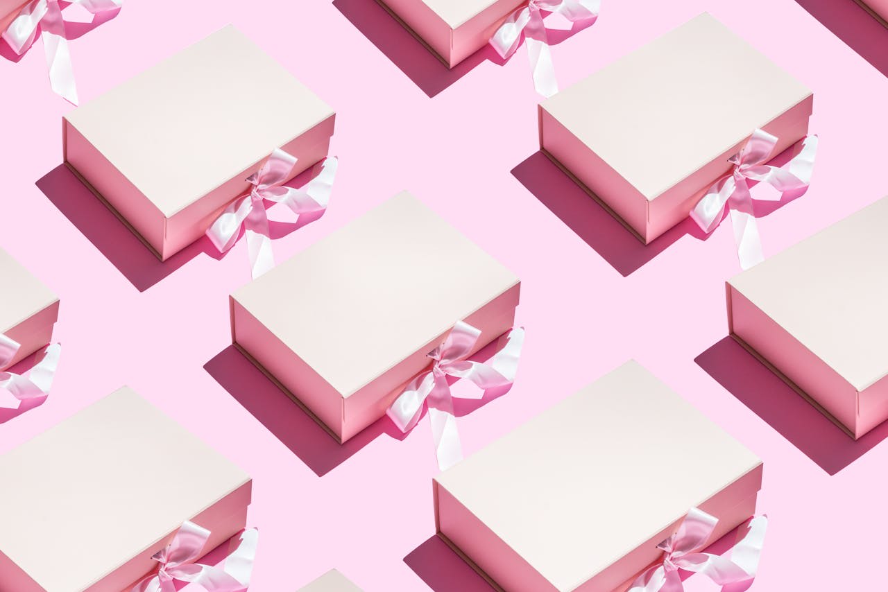 Photo by Jacob  Seaborn: https://www.pexels.com/photo/pink-boxes-with-pink-ribbons-15770800/ 