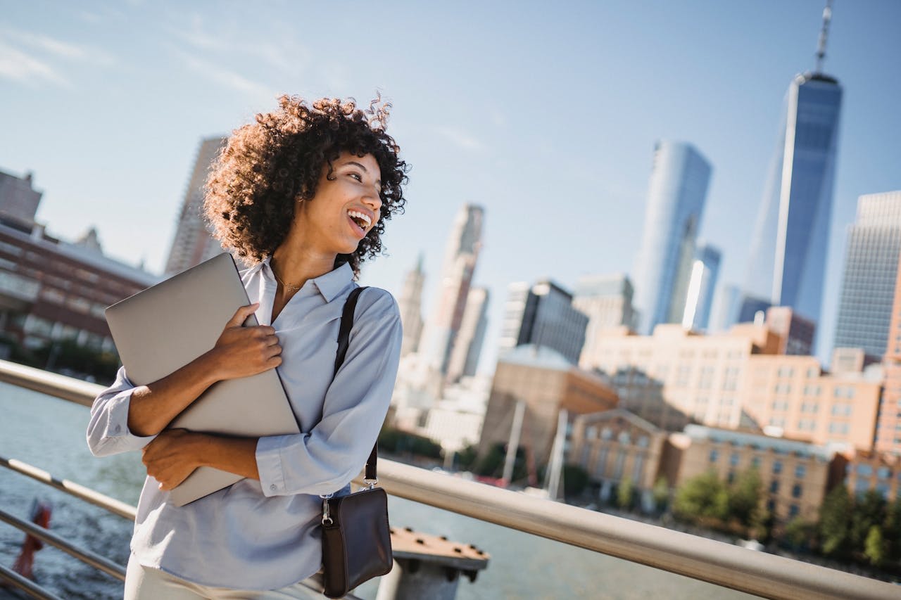 Photo by Roberto Hund: https://www.pexels.com/photo/happy-woman-in-city-downtown-5357621/ 