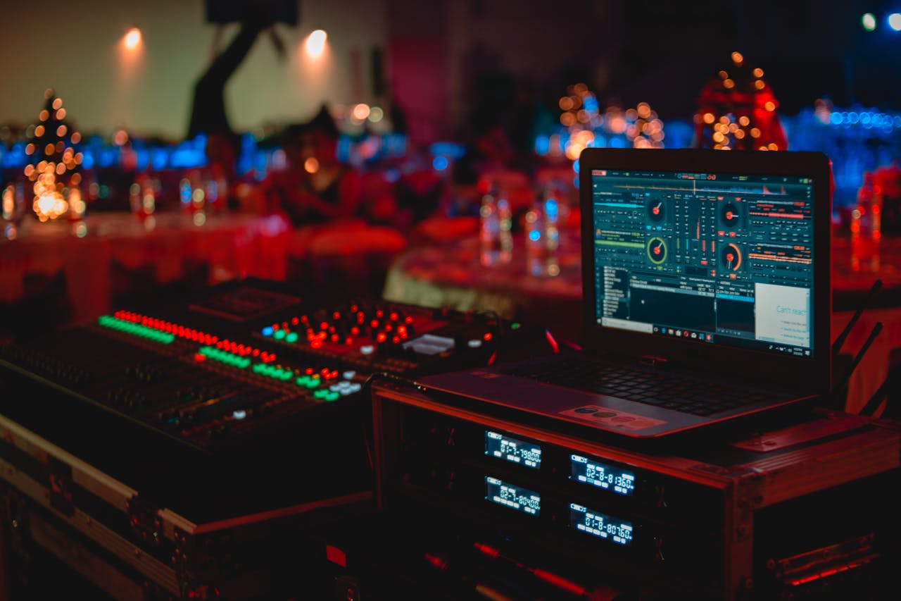 Photo by Abet Llacer: https://www.pexels.com/photo/black-laptop-beside-audio-mixer-set-919734/ 