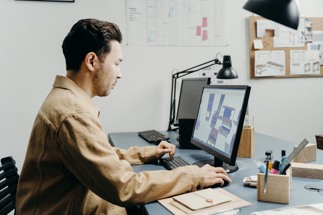 https://www.pexels.com/photo/a-man-in-brown-long-sleeves-using-computer-7504612/  Photo by cottonbro studio on Pexels