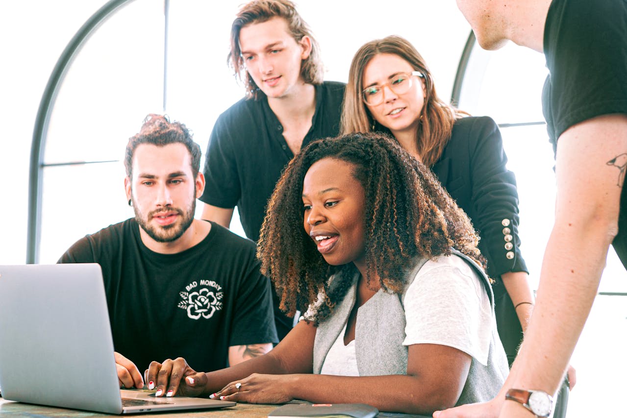 Photo by Canva Studio: https://www.pexels.com/photo/woman-sharing-her-presentation-with-her-colleagues-3153198/