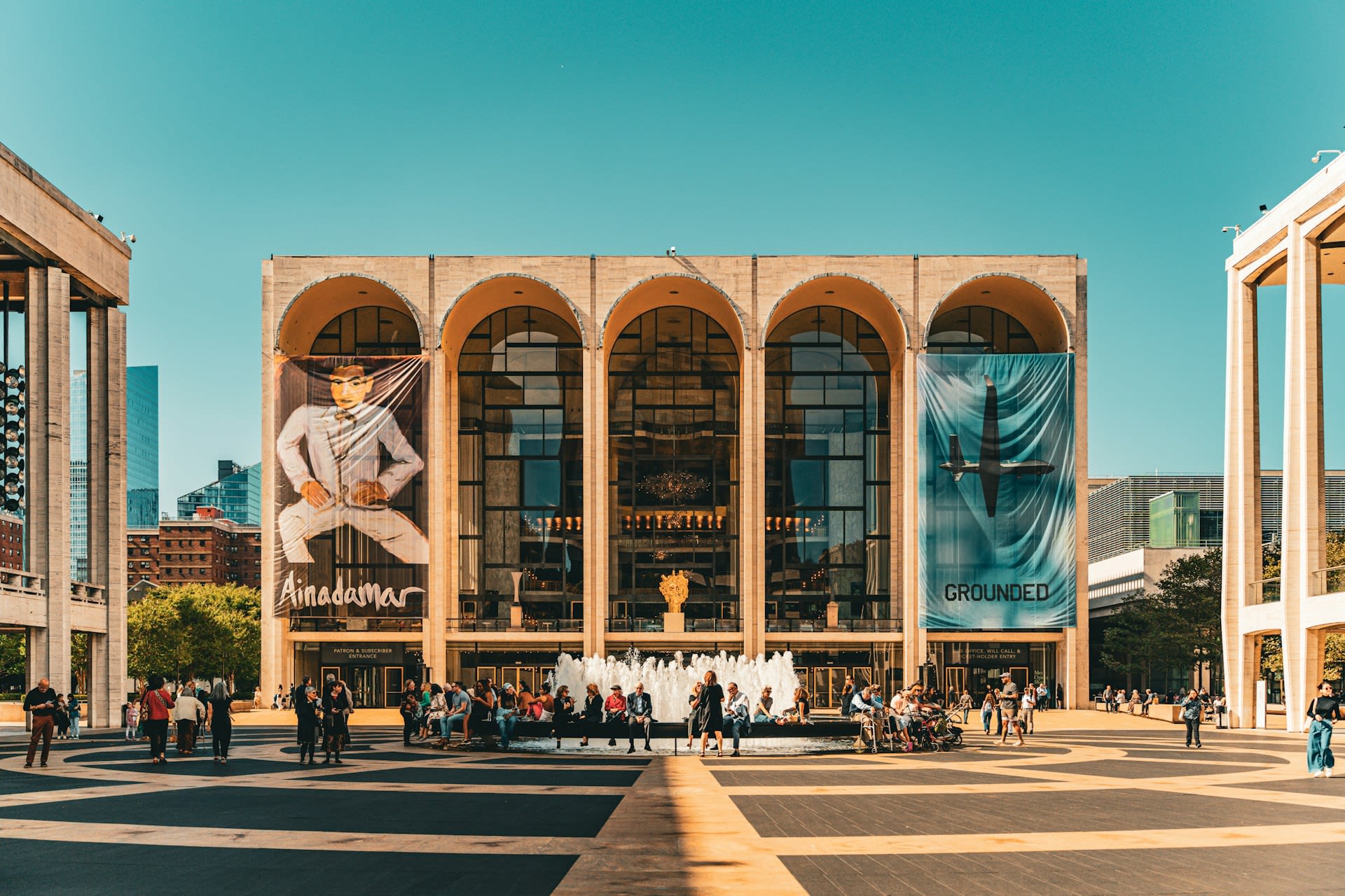 https://unsplash.com/photos/a-group-of-people-standing-in-front-of-a-building-lGJW0YEM598  Photo by Nils Huenerfuerst on Unsplash