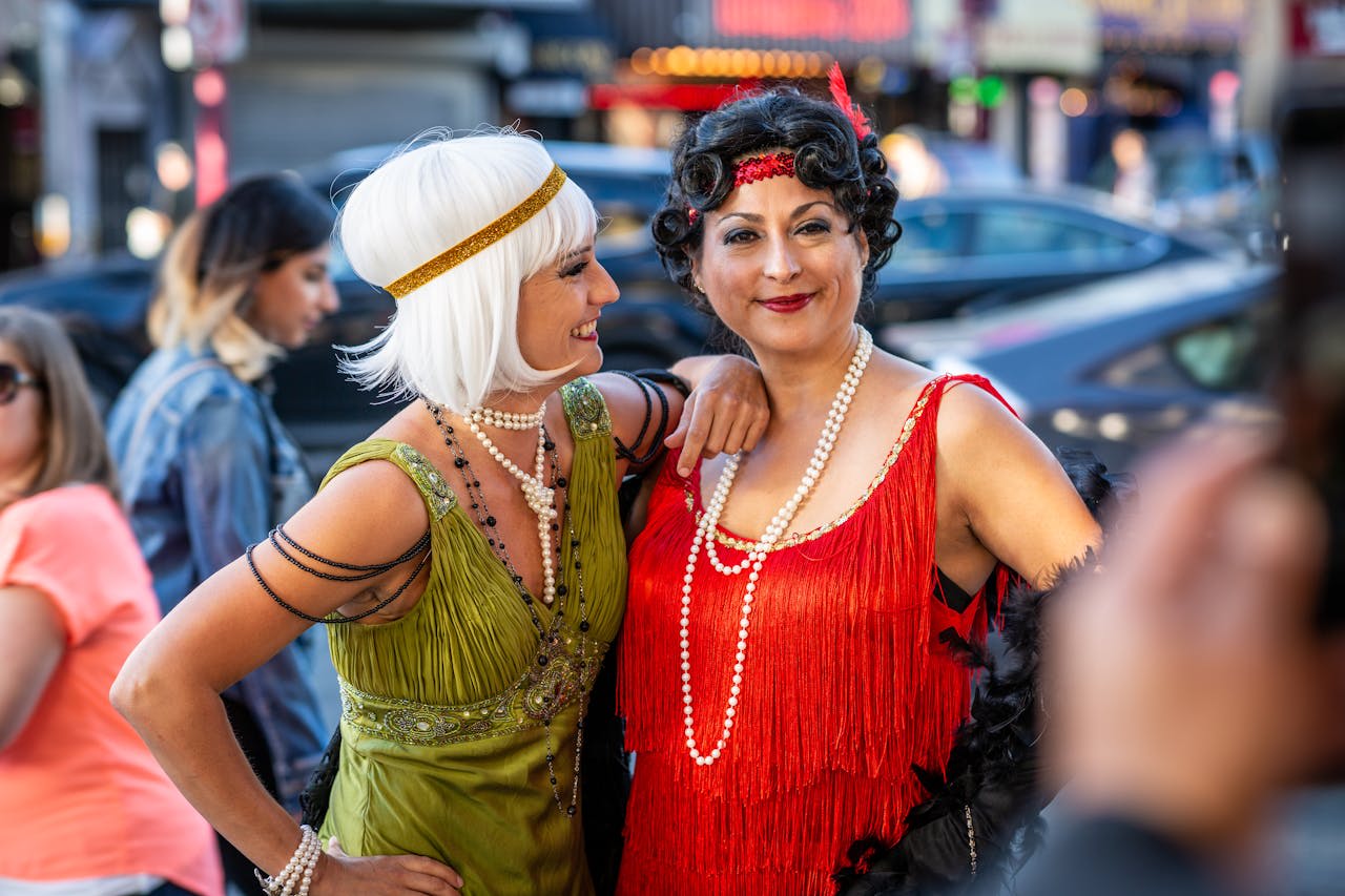 Photo by Victor L.: https://www.pexels.com/photo/two-women-wearing-red-and-green-dresses-1262453/