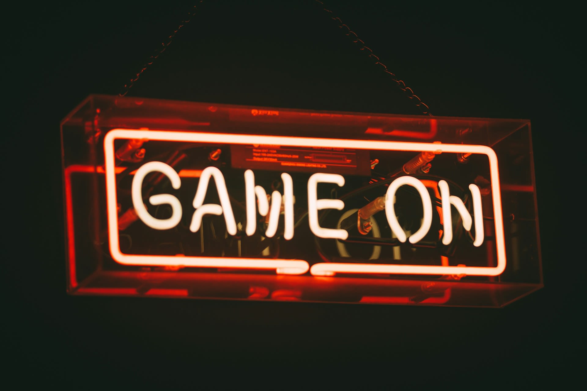 Photo by 8 verthing on Unsplash https://unsplash.com/photos/red-and-white-game-on-led-signage-k_pBB5wJtaU 