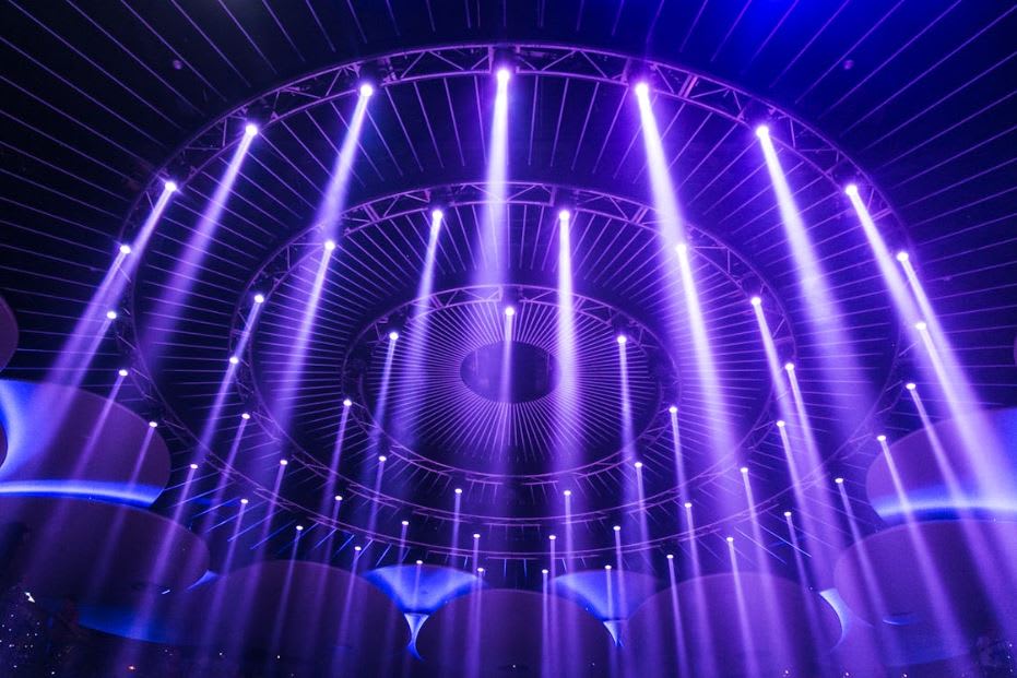 Photo by Wendy Wei: https://www.pexels.com/photo/round-metal-frame-with-disco-light-1555900/ 