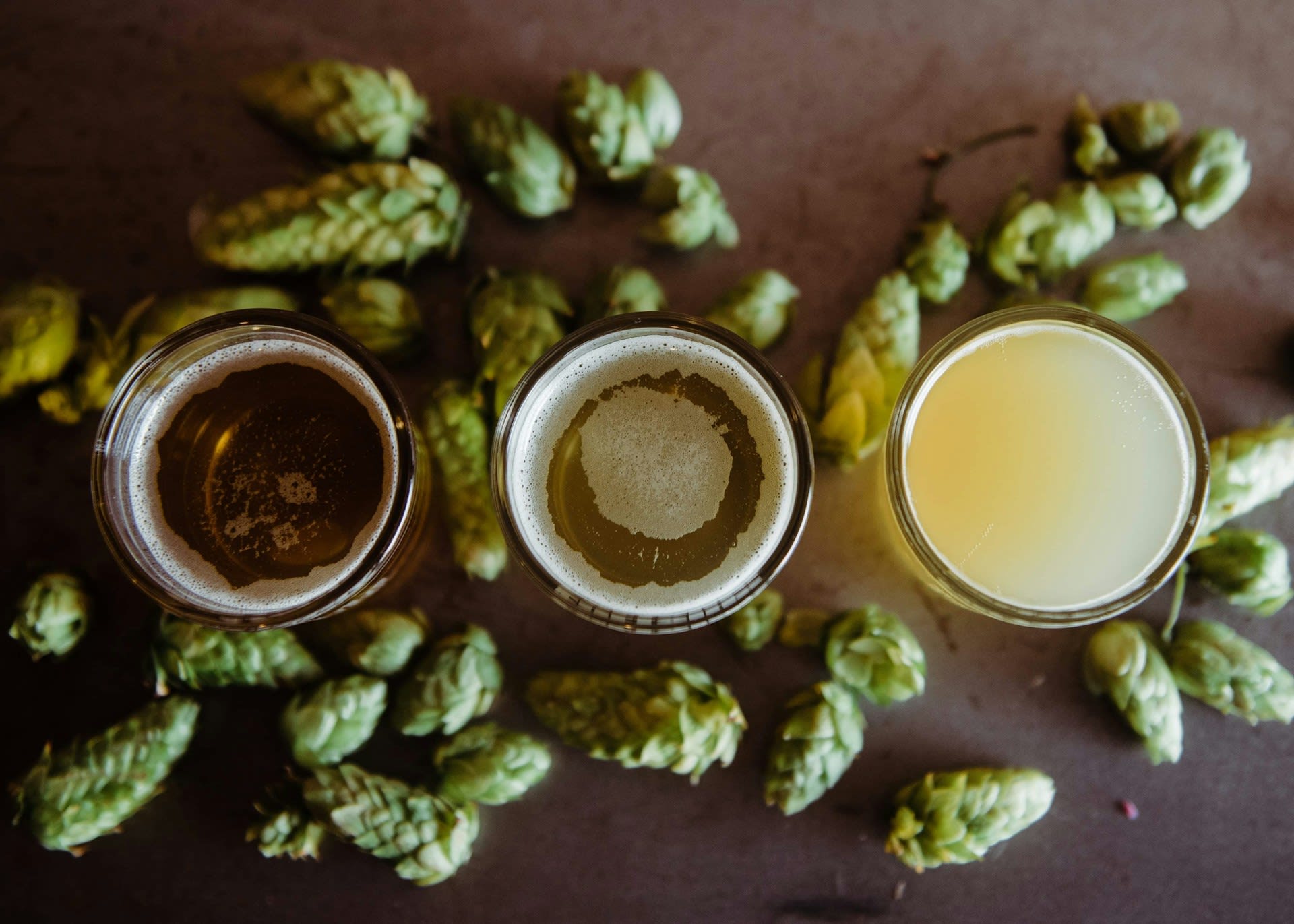 https://unsplash.com/photos/three-filled-glasses-on-gray-surface-OMIgwm1i_NY  Photo by Missy Fant on Unsplash