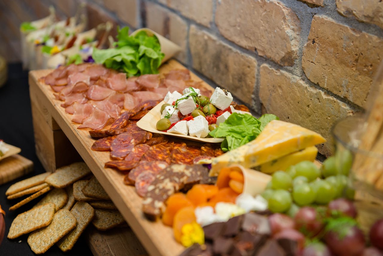 Photo by Milan: https://www.pexels.com/photo/buffet-with-various-sausages-and-cheese-on-sideboard-4639393/