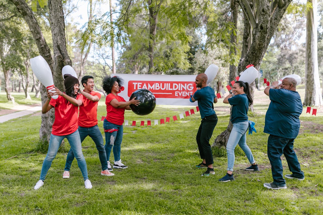Photo by RDNE Stock project: https://www.pexels.com/photo/people-holding-toy-bowling-pins-and-playing-a-game-7551733/