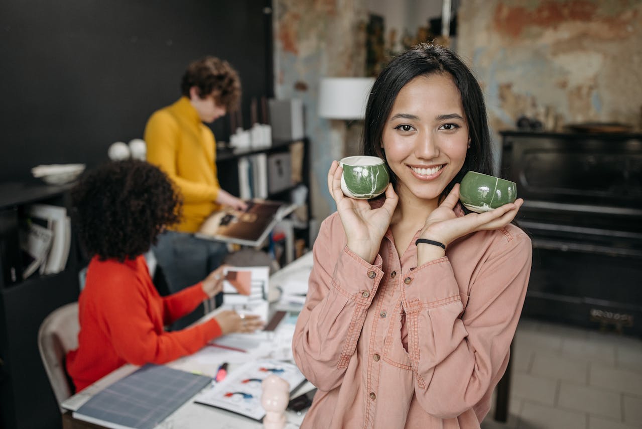 Photo by Pavel Danilyuk: https://www.pexels.com/photo/a-woman-holding-ceramic-cups-7674841/ 