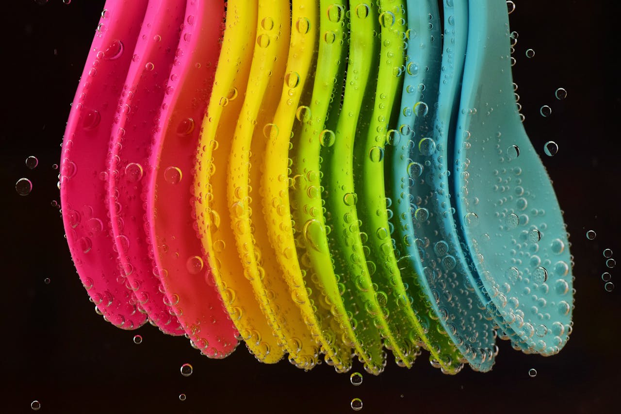 Photo by Pixabay: https://www.pexels.com/photo/assorted-color-spoon-lot-in-water-531643/ 