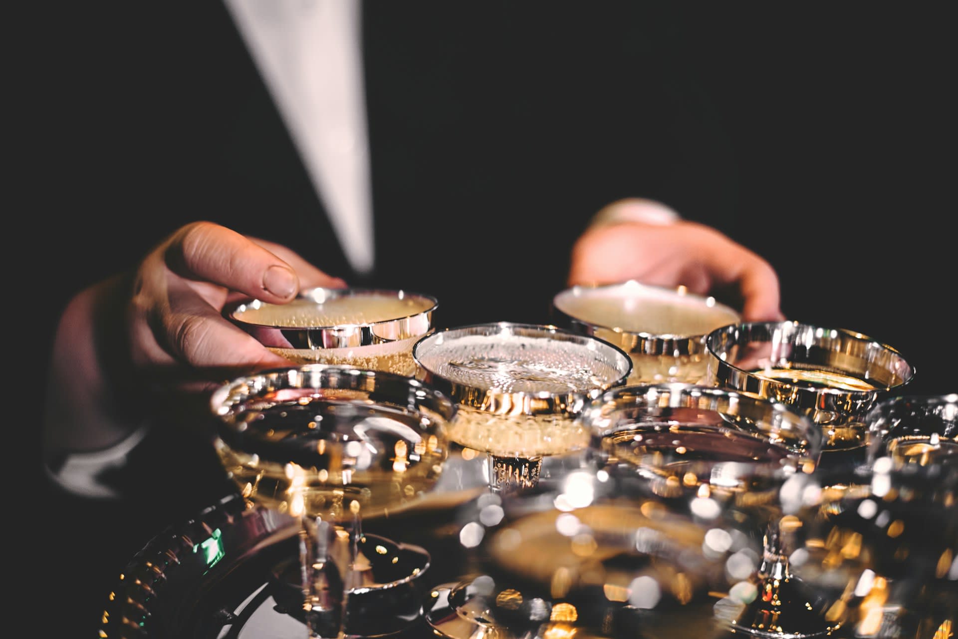 Photo by Billy Huynh on Unsplash https://unsplash.com/photos/person-standing-beside-martini-glasses-WR3ftvEuee