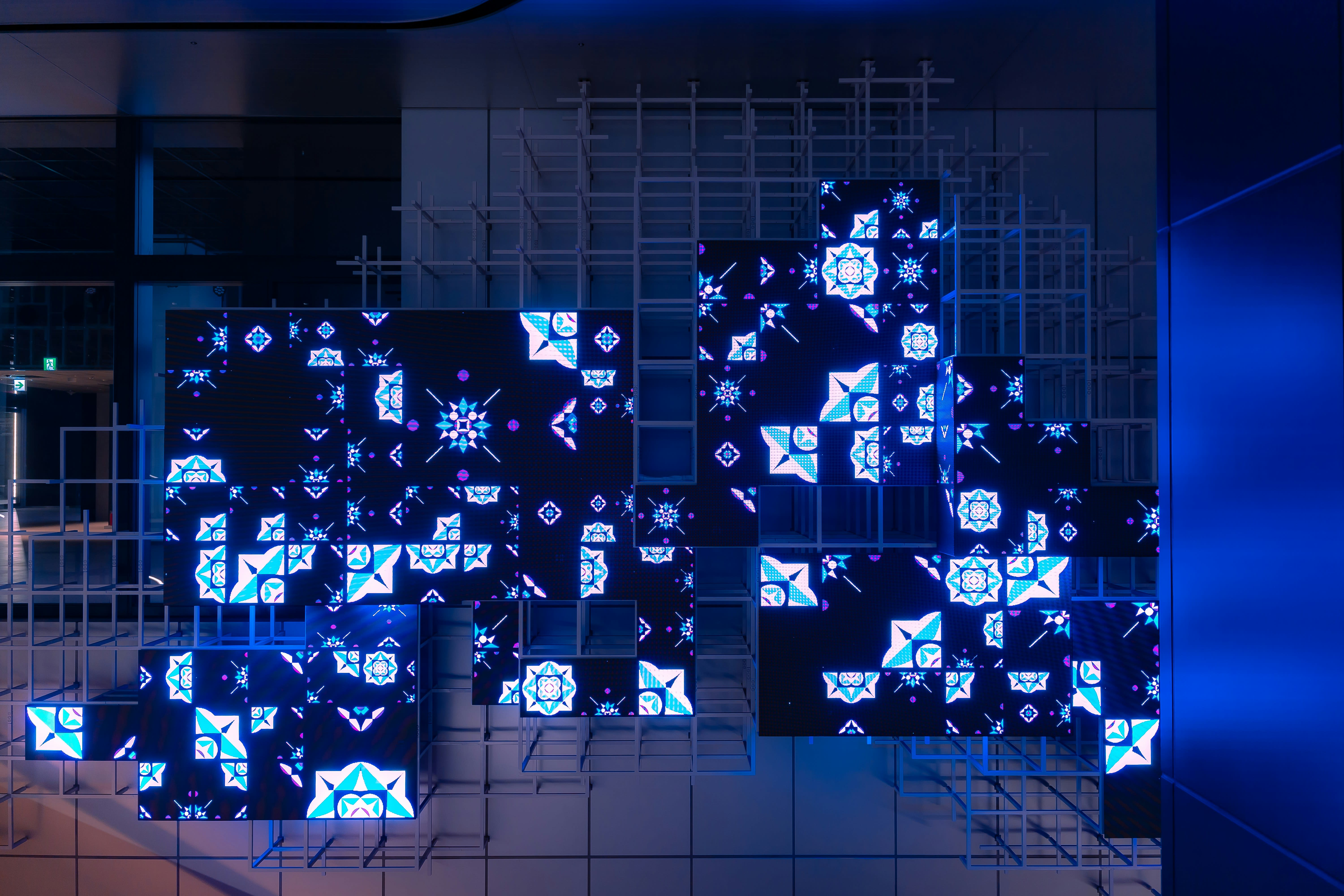 https://unsplash.com/photos/a-group-of-squares-that-are-on-a-wall-PH0z4LnH1N0
