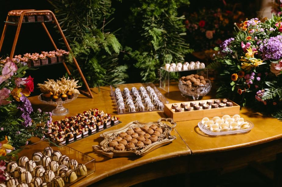 https://unsplash.com/photos/a-wooden-table-topped-with-lots-of-desserts-rjnLc_Jwa0M 