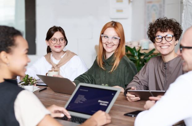 https://www.pexels.com/photo/group-of-people-sitting-3184352/