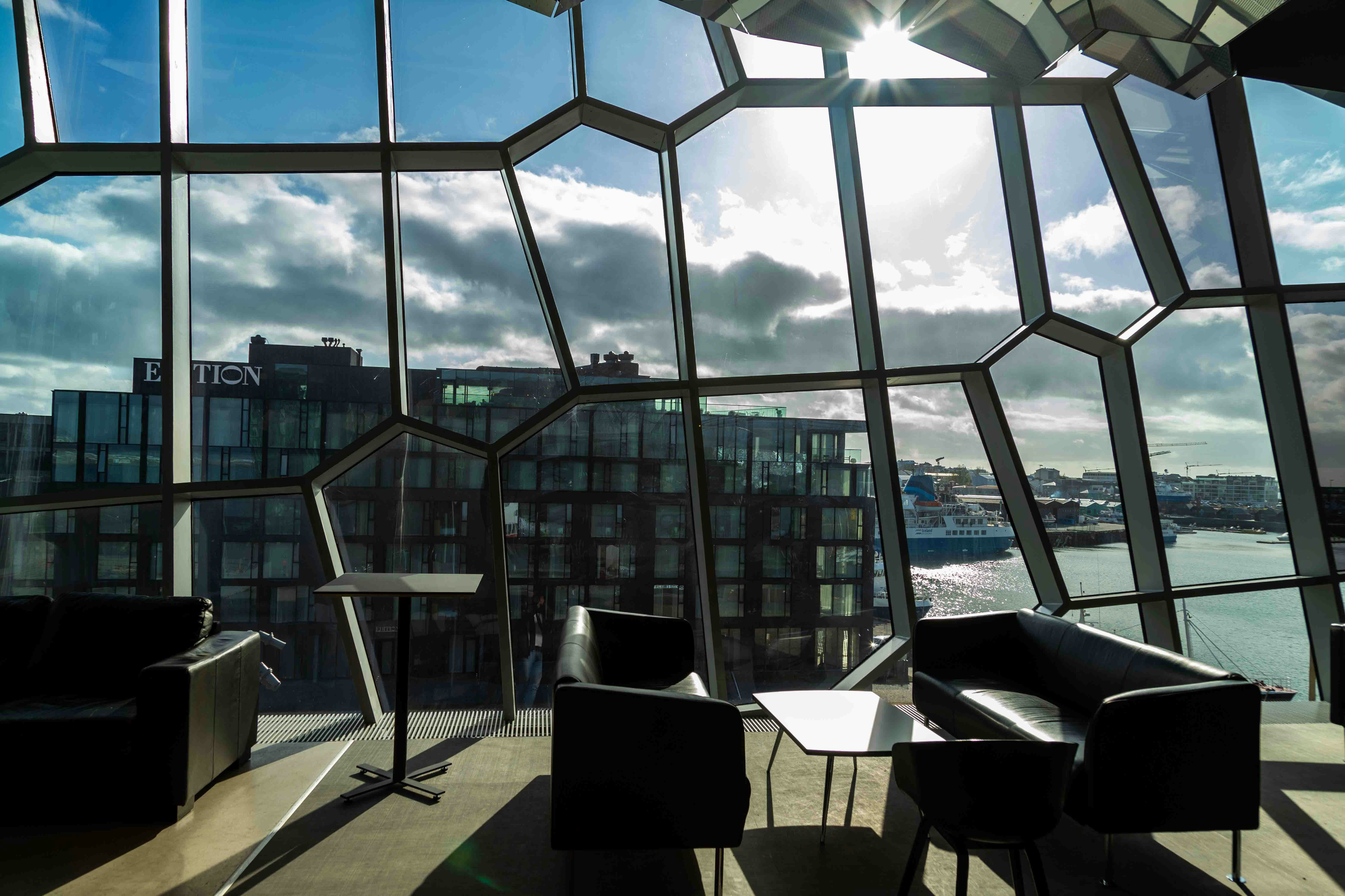 https://unsplash.com/photos/the-sun-shines-through-the-windows-of-a-modern-building-8d_mSO1rN1s