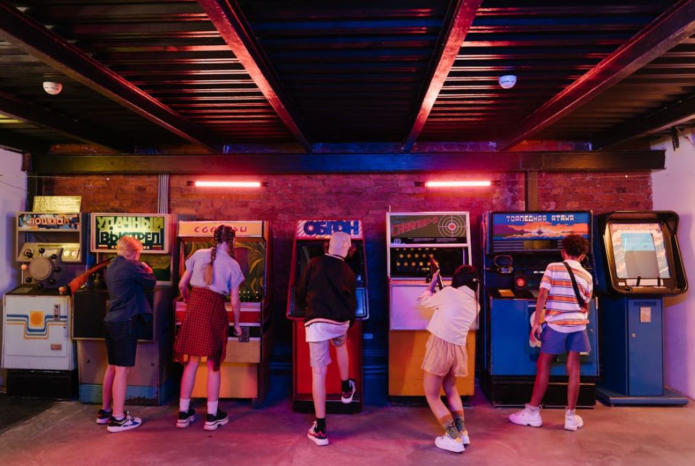 https://www.pexels.com/photo/people-standing-in-front-of-store-during-night-time-4836371/ Photo by cottonbro studio on Pexels