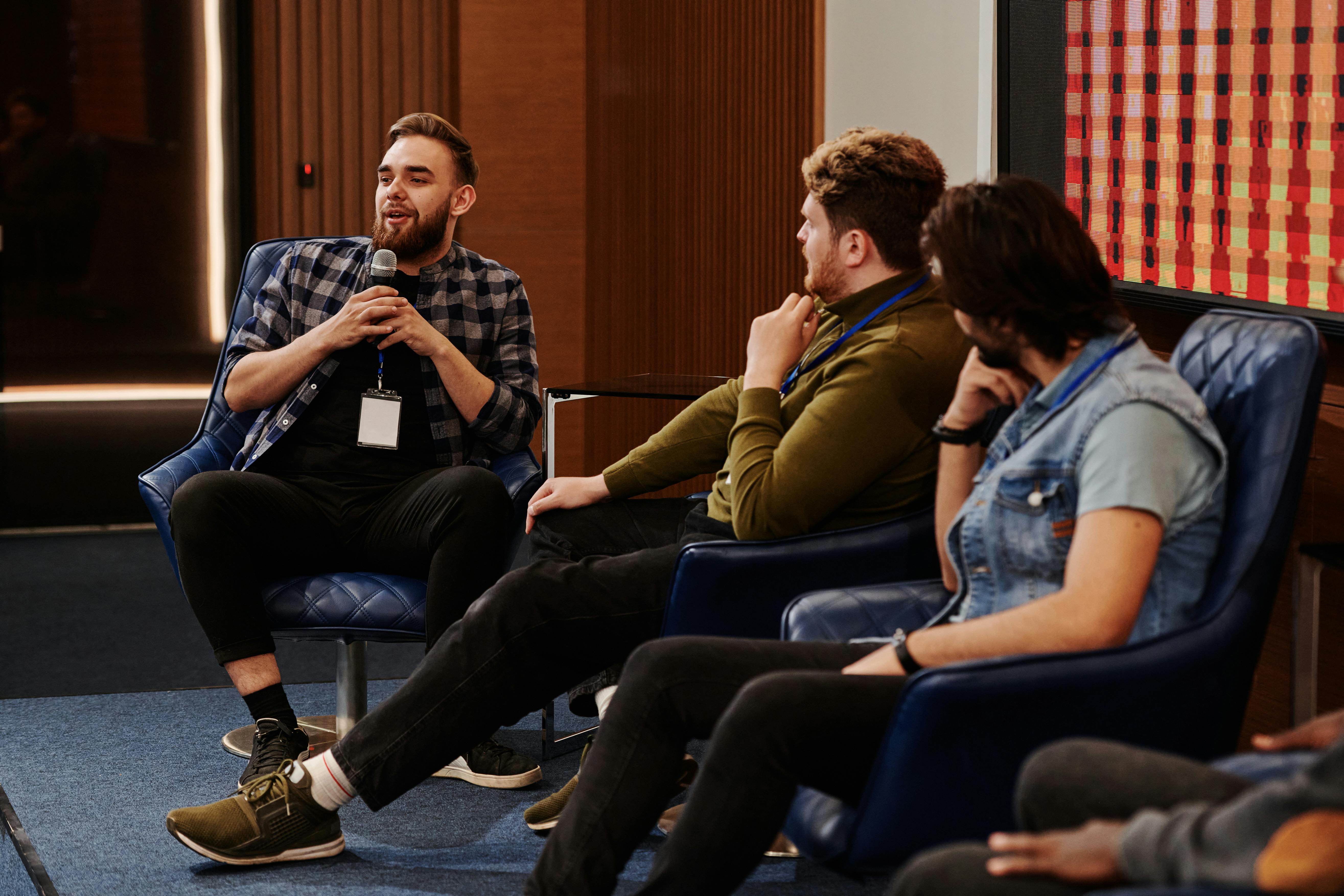Photo by Henri Mathieu-Saint-Laurent: https://www.pexels.com/photo/male-professional-talking-using-microphone-8348625/