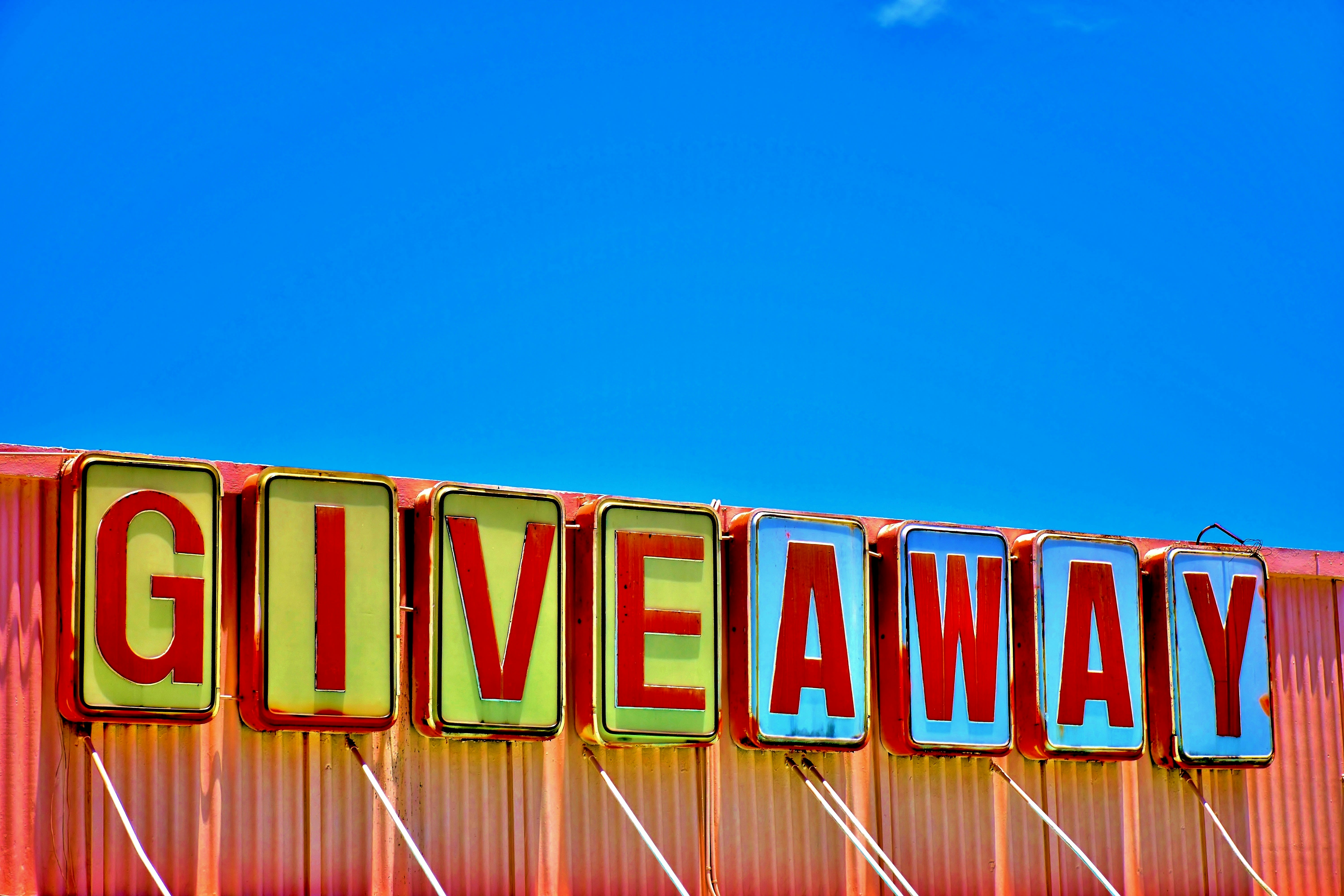 https://unsplash.com/photos/giveaway-warehouse-signage-RVtnDX3Vmo4