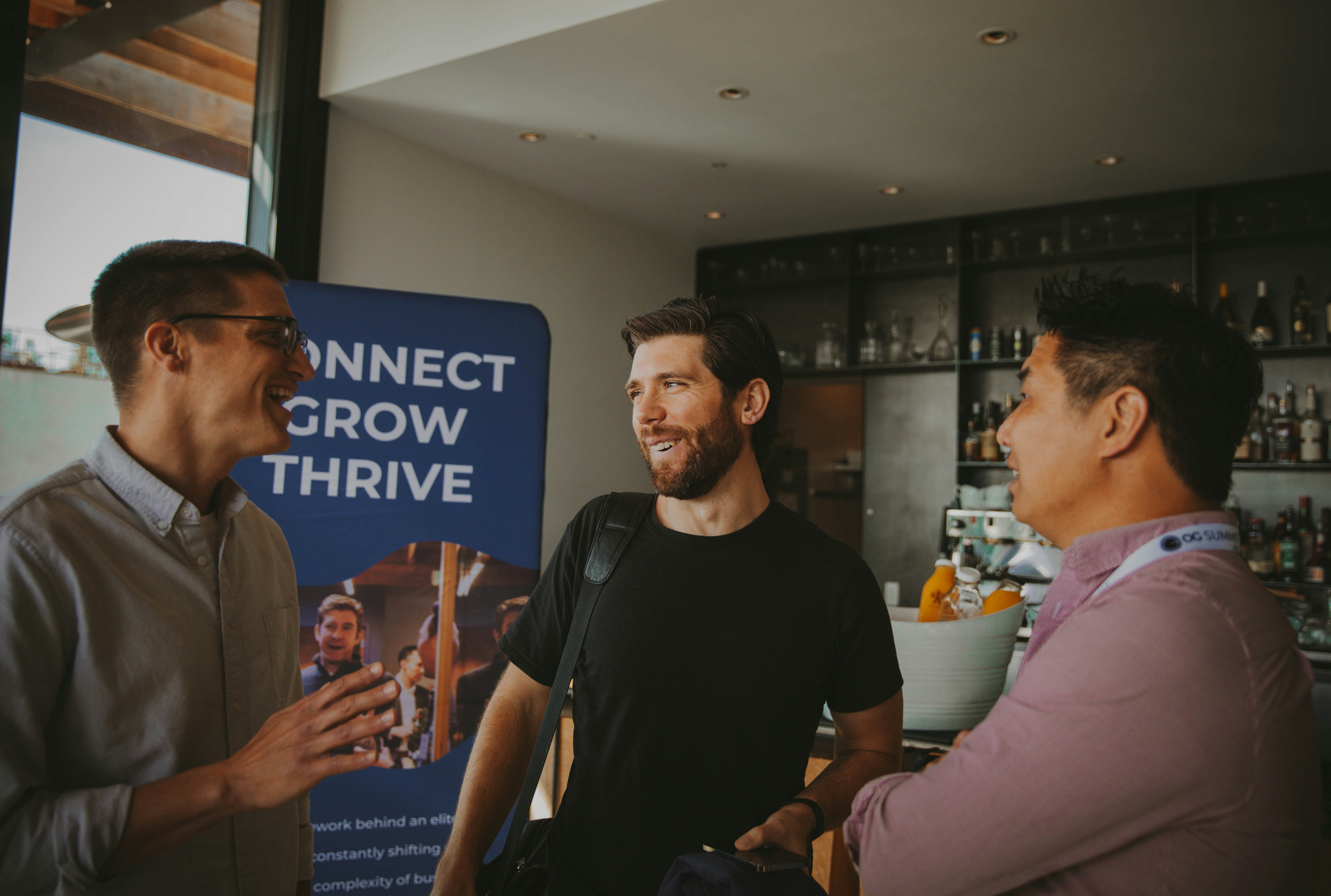 https://unsplash.com/photos/a-group-of-three-men-standing-next-to-each-other-p_3N8HTylLs