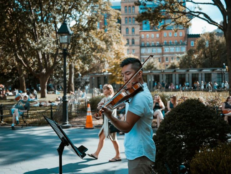 https://unsplash.com/photos/man-playing-violin-at-the-park-YvLGz8h_oiY 
