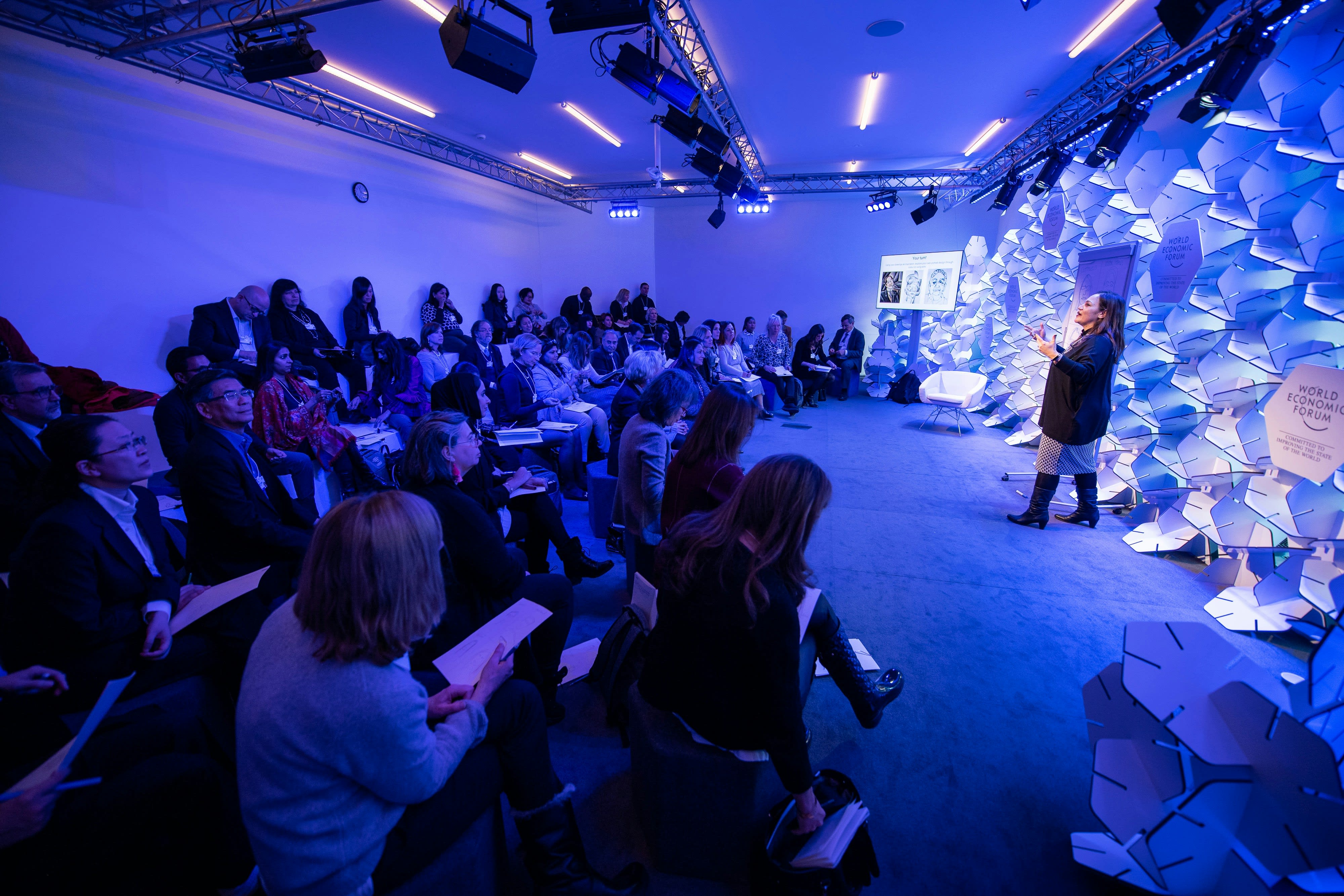 https://unsplash.com/photos/woman-making-speech-in-front-of-people-sitting-on-individual-chairs-CiO3eBBxqJA