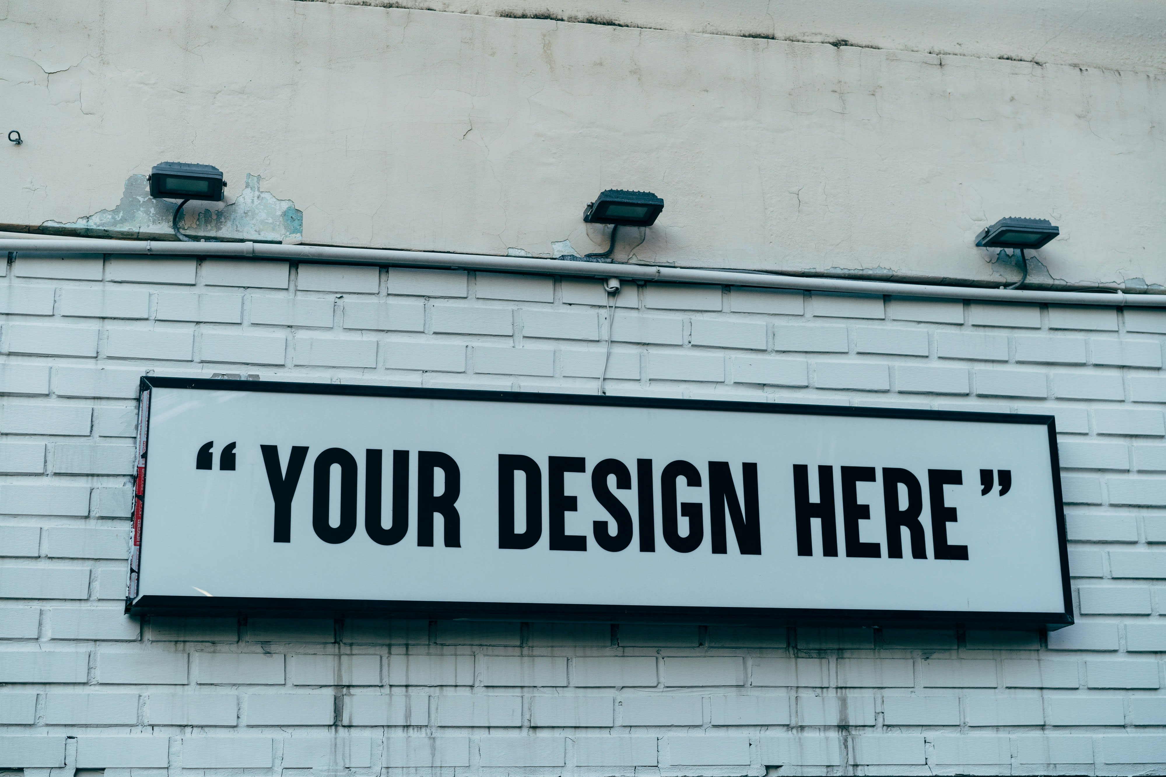 https://unsplash.com/photos/a-sign-on-a-building-eEwINnR9Yo8