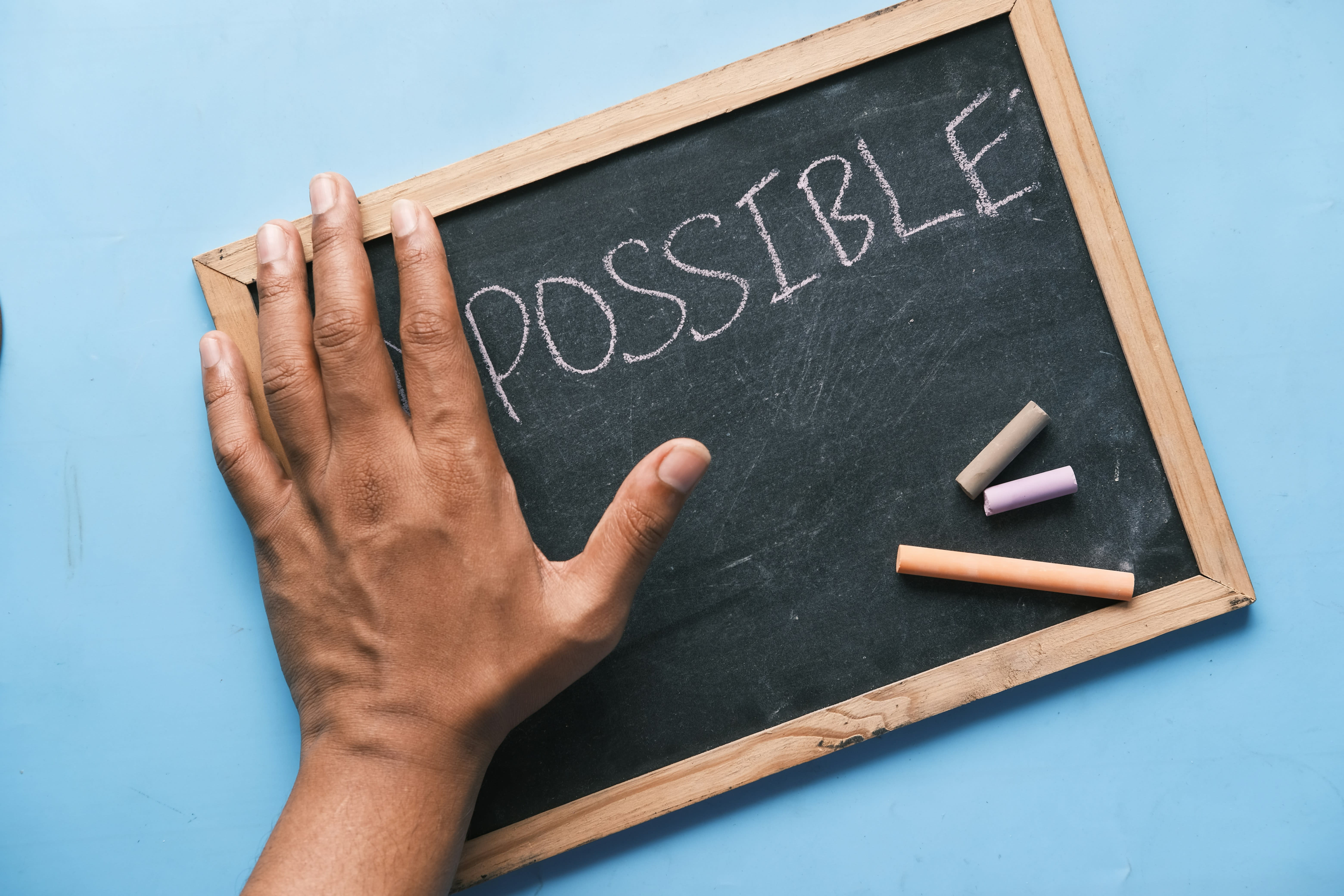 https://unsplash.com/photos/a-chalkboard-with-the-word-possible-written-on-it-Jxi526YIQgA
