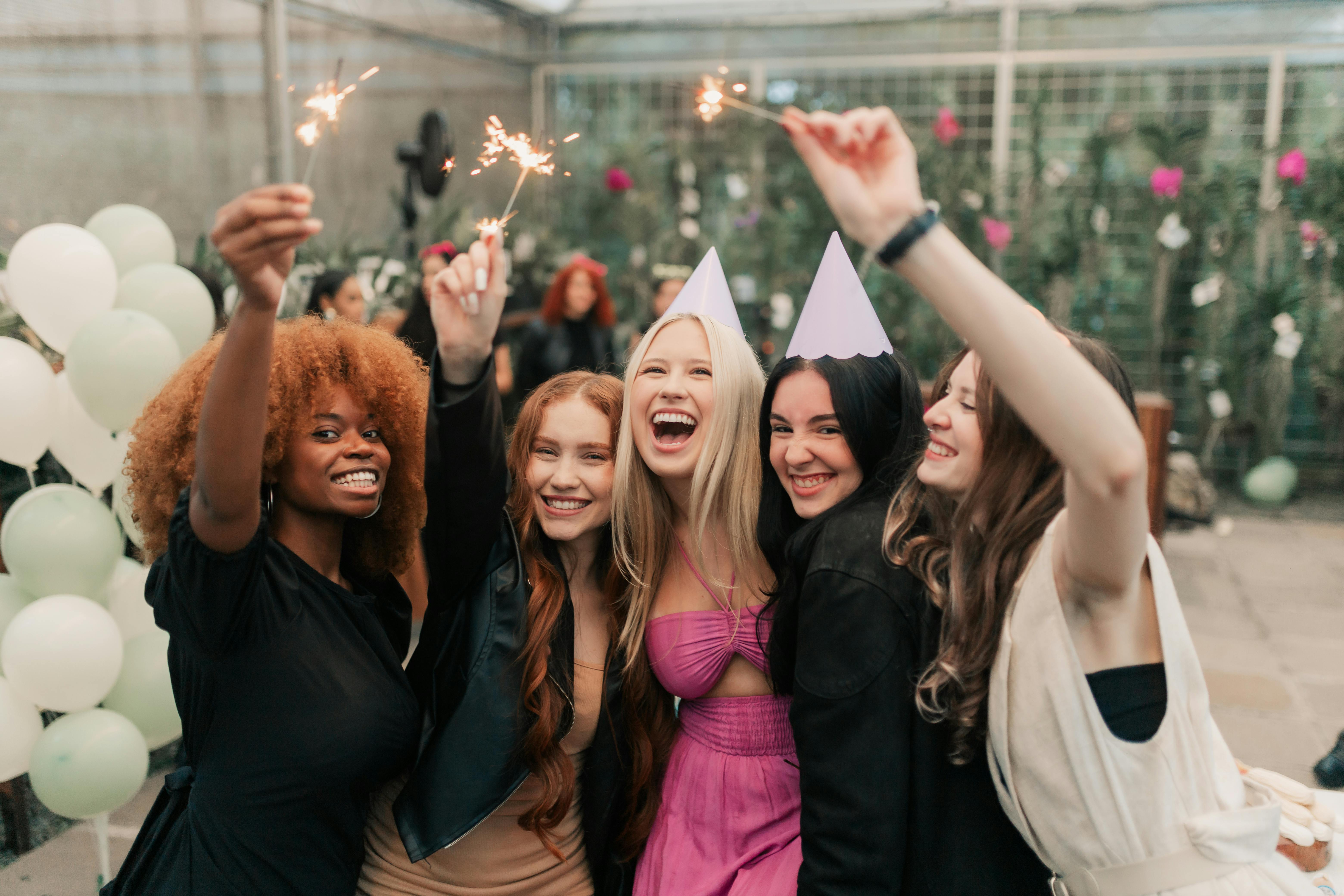 Photo by Pexels: https://www.pexels.com/photo/joyful-birthday-party-with-sparklers-and-friends-photo-by-alexander-mass-32333364/ 